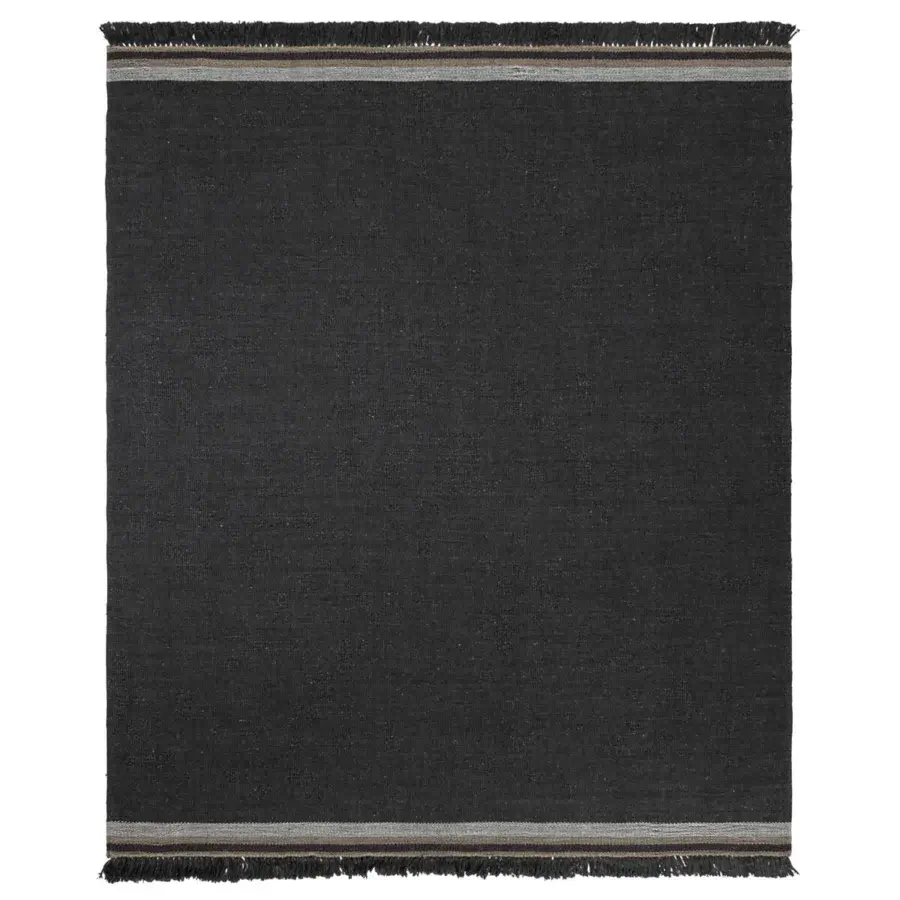 Distinguished Amini Coco rug crafted from 100% recycled PET with subtle gray stripes and hand-clipped detailing