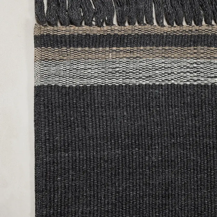 Exceptional Amini Coco rug with dark grey and neutral beige stripes crafted from recycled PET with a hand-weaving and hand-clipped finish