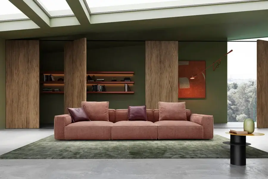 Exceptional Egoitaliano Plaza sofa with muted rose-pink and reddish-brown cushions upholstered in textured fabric with black ABS feet