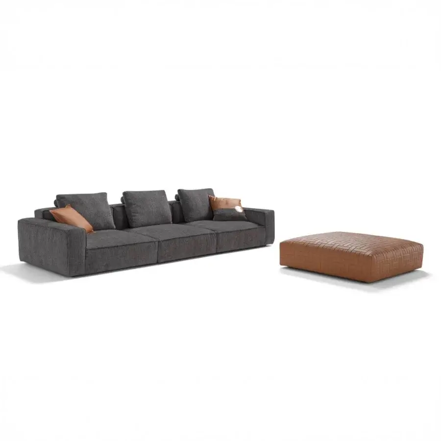 Superior Egoitaliano Plaza sofa with dark gray textile upholstery, wood frame construction and reddish-brown woven ottoman