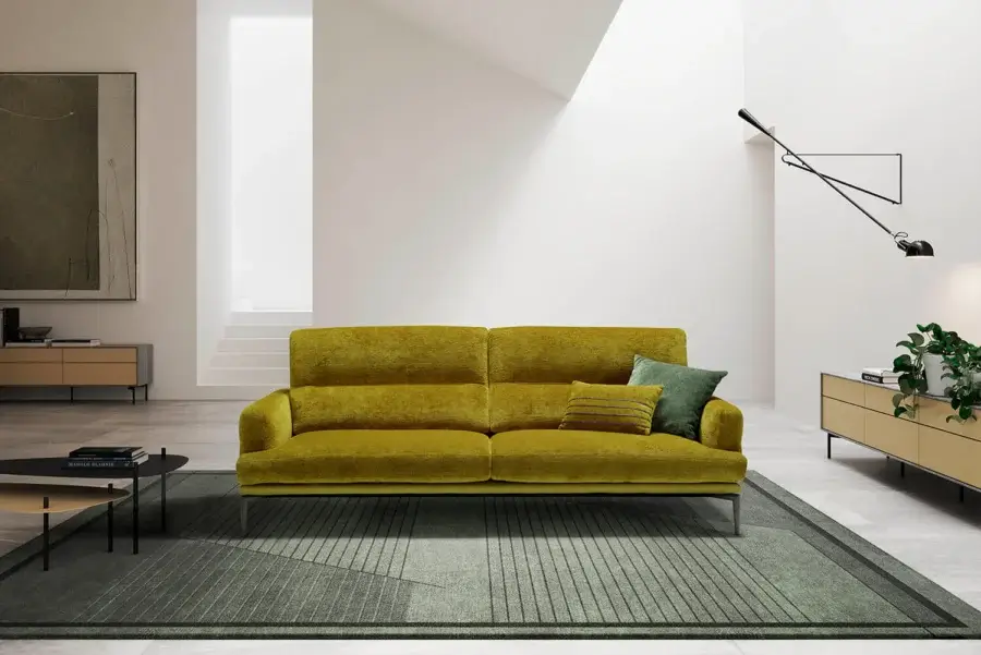 Superior Egoitaliano Feng sofa with textured muted golden-yellow textile upholstery and dark epoxy powder-coated metal base