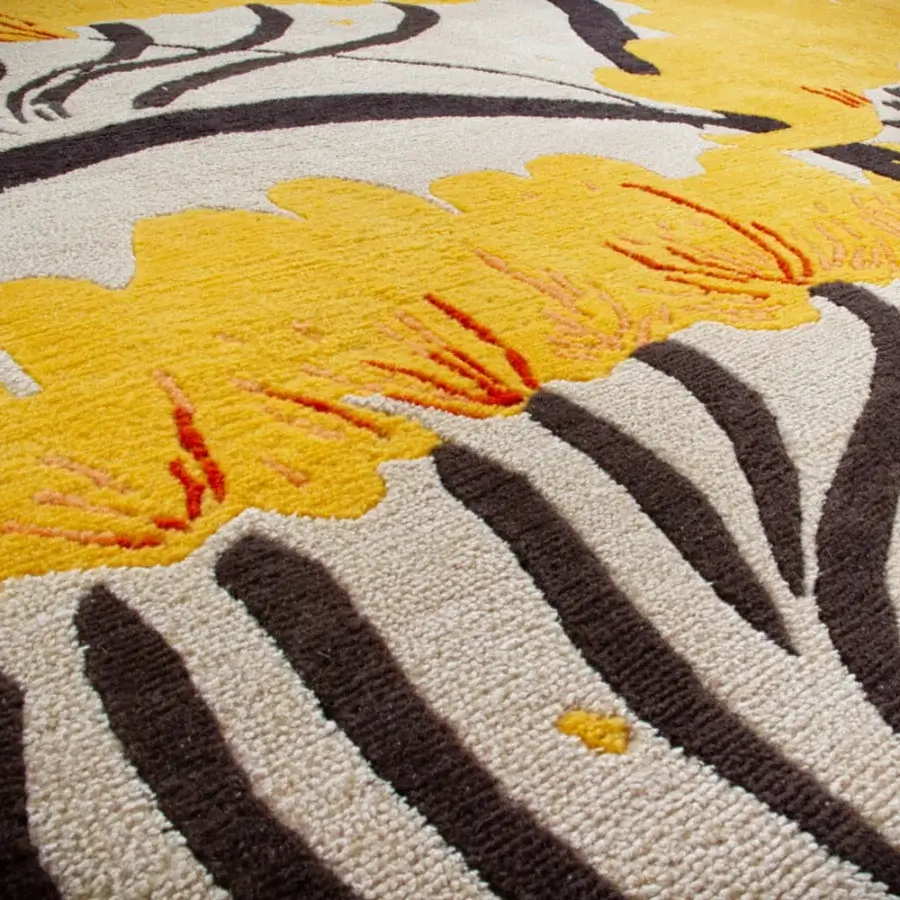 Superior Amini Valparaise rug with bold floral patterns and zebra-like stripes hand-knotted in silk and New Zealand wool with a carved finish