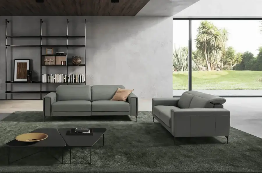 Distinguished Egoitaliano Gary sofa with muted gray textile upholstery and dark epoxy finished metal legs