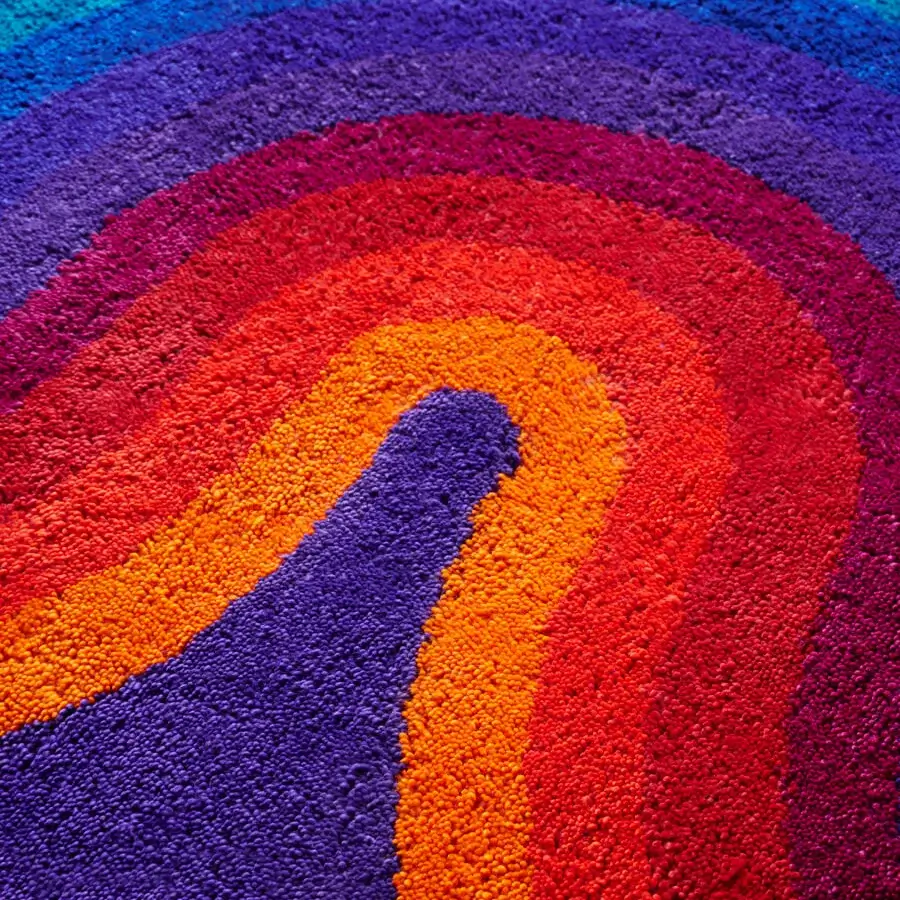 Distinguished Amini Romantica-Curve rug exhibiting a rainbow gradient within a fluid form, hand-tufted in New Zealand wool with a carved texture