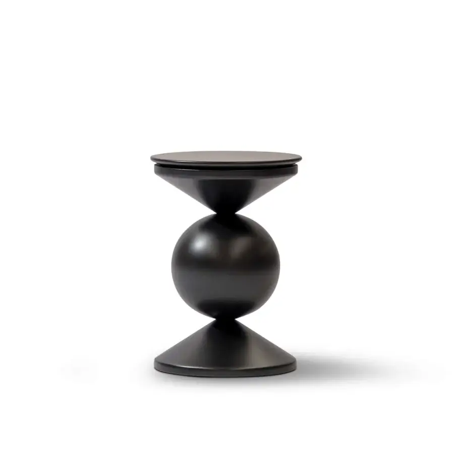 Distinctive Mascheroni Caramella side table crafted in wood with a muted dark gray matte finish and flowing lines
