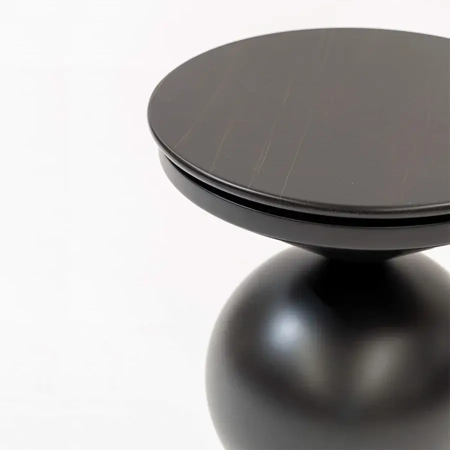 Distinguished Mascheroni Caramella side table crafted in wood with a Sahara Noir Marble top and matte dark toned finish