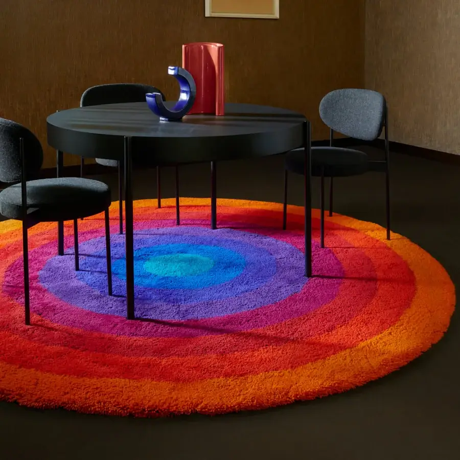 Exceptional Amini Romantica-Circle rug with a vibrant color gradient and hand-tufted New Zealand wool pile height