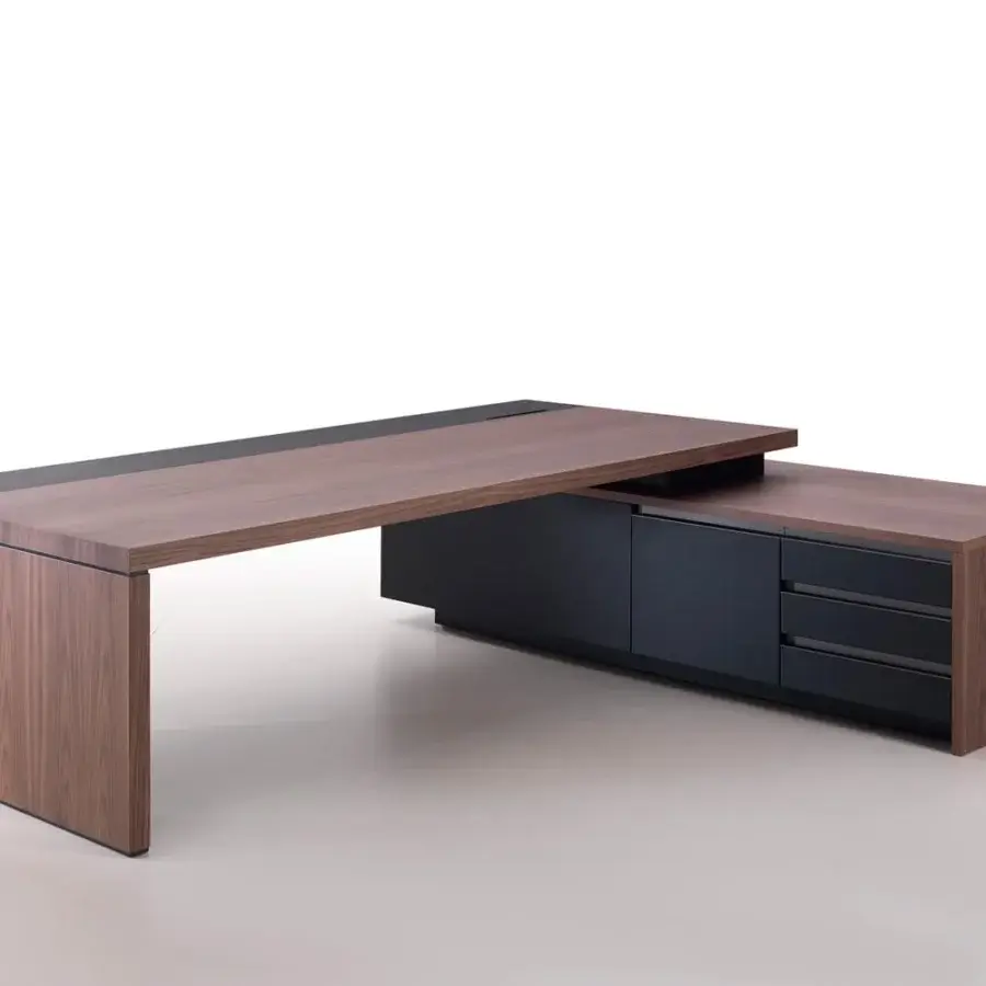 Superior 4 Mariani Kefa desk with immense intersecting volumes, a soft leather inlay in medium-toned wood with visible grain patterns