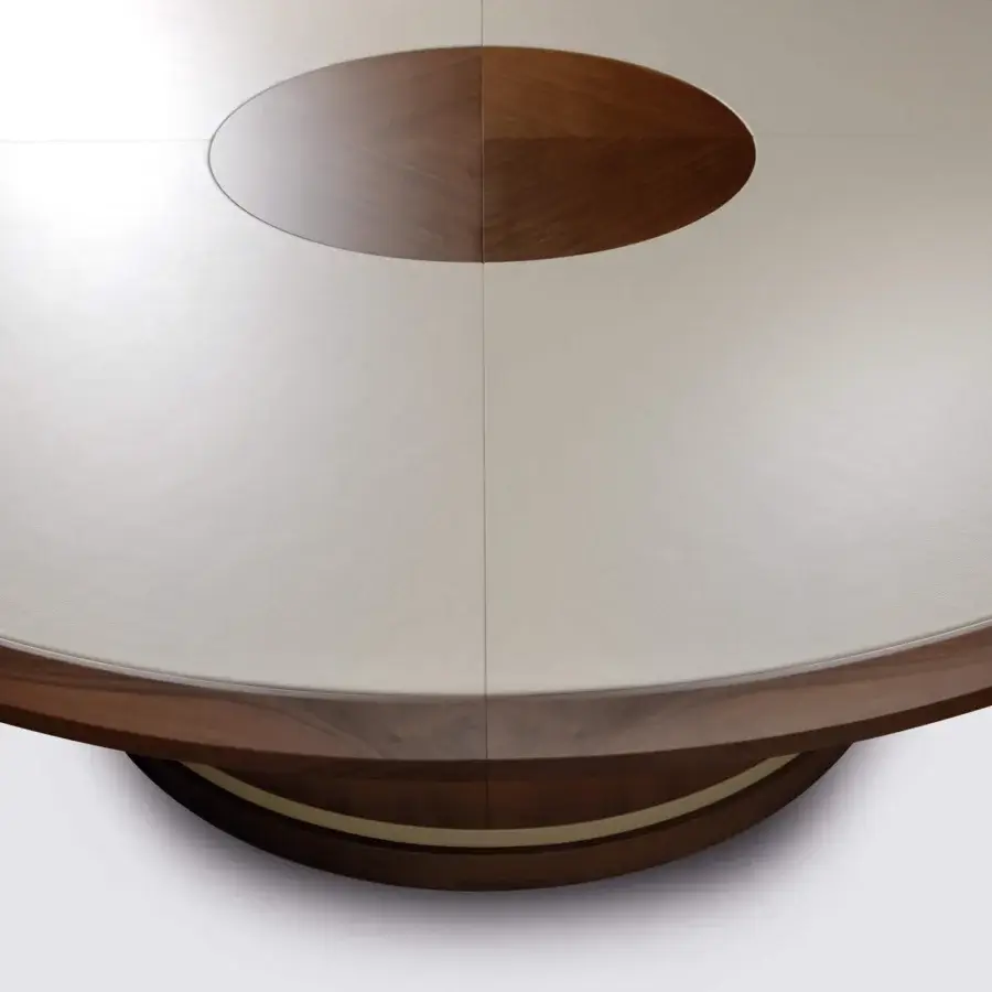 Superior Mascheroni Giubileo round conference table with leather tabletop and darker wood insert built with a metal structure and satin finish