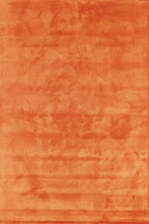Lavish Egoitaliano Eros rug crafted in saturated orange polyamide with subtle tonal variations and matte finish