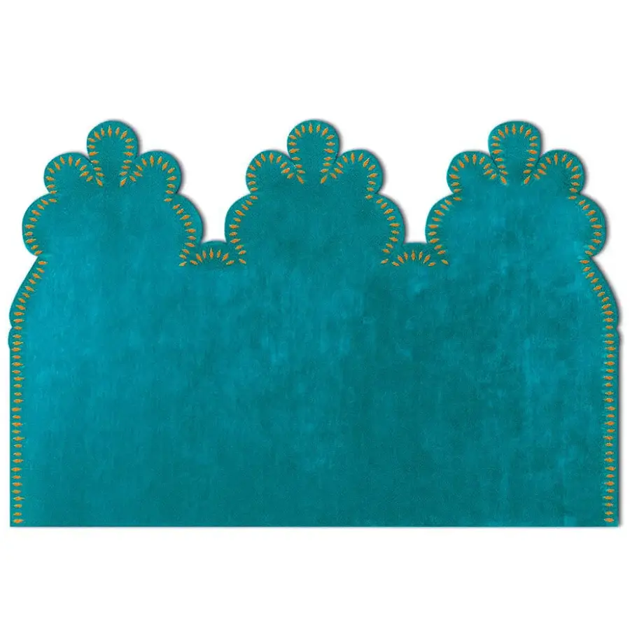 Stunning Egoitaliano Merlino rug crafted in teal blue wool with a golden-yellow stitched, scalloped border and textured finish