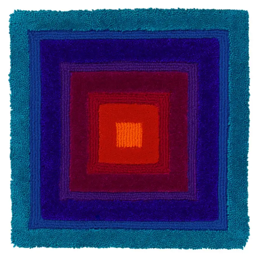 Superior Amini Domino rug with concentric designs in teal, purple, and red New Zealand wool, hand-washed and carved