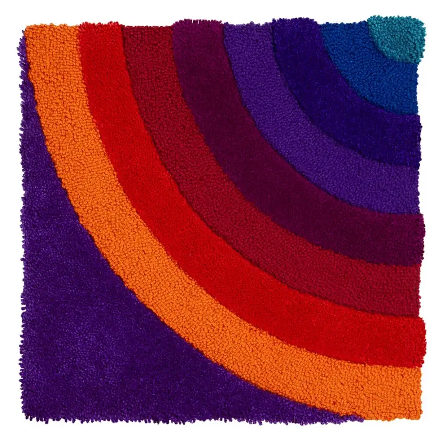 Distinguished Amini Domino rug crafted with concentric bands in purple, violet, red, orange, and blue New Zealand wool with a hand-carved texture