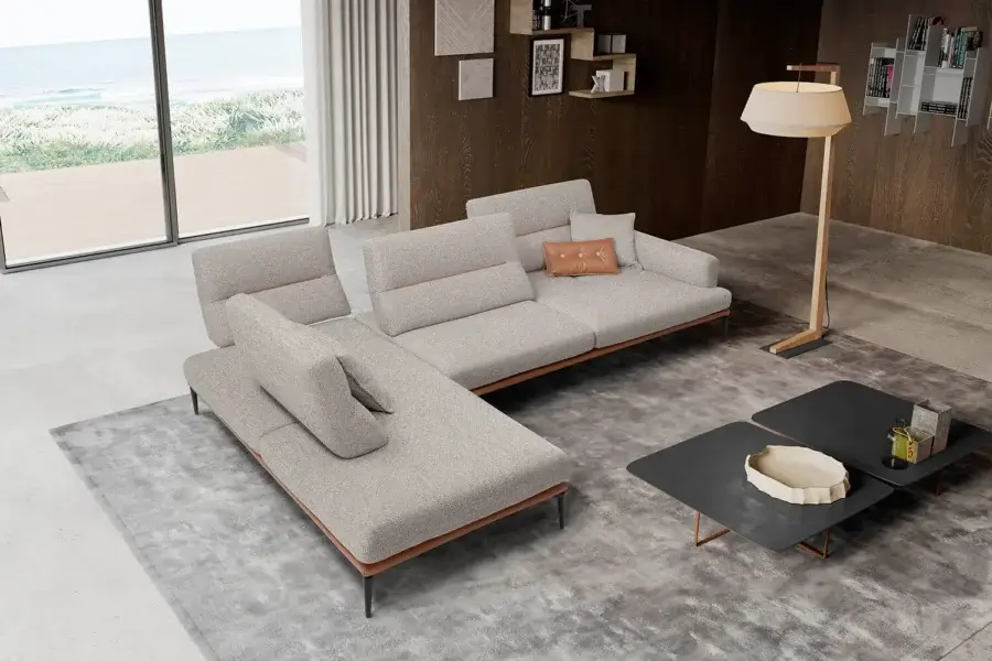 Harmonious Egoitaliano Feng sectional with neutral gray textile upholstery and warm brown birch plywood base with epoxy powder-coated metal legs