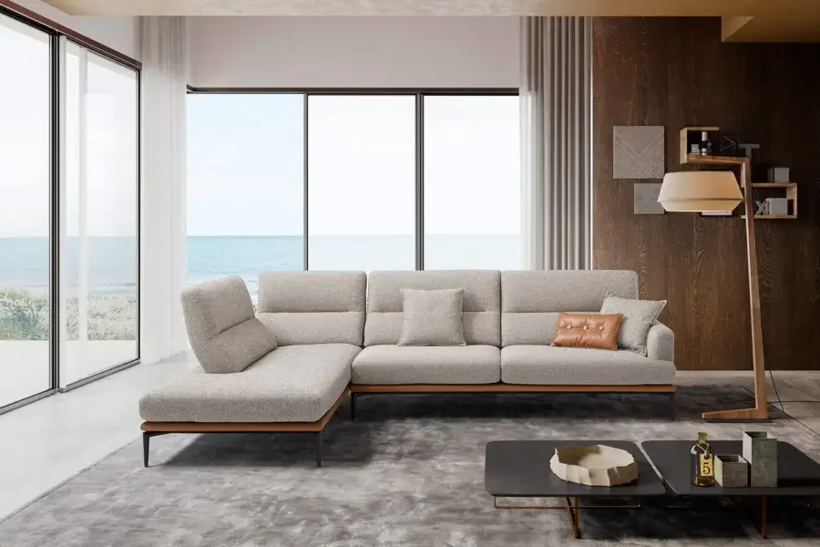 Exclusive Egoitaliano Feng sectional with textured neutral gray textile upholstery and reddish-brown detailing built in Italy