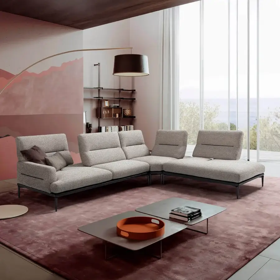 Elegant Egoitaliano Feng sectional with light neutral gray textile upholstery and sleek epoxy powder-coated metal feet