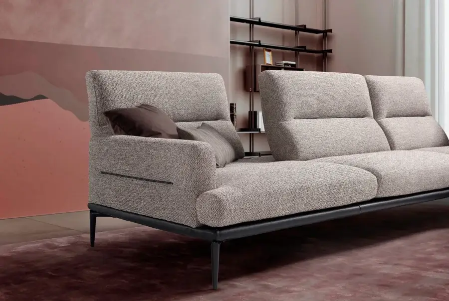 Captivating Egoitaliano Feng sectional with light greige textile upholstery, metal legs and adjustable swing backrests