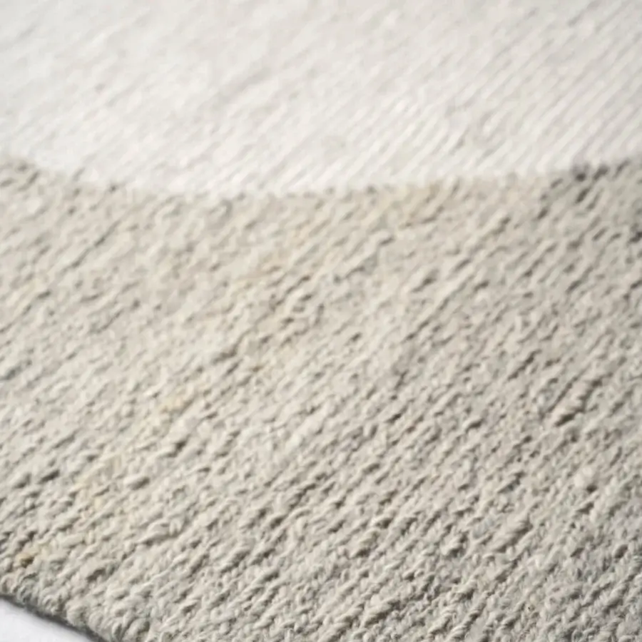 Exceptional Amini Jean rug with a striking black, ivory and dark grey design hand-clipped from soft wool in Italy