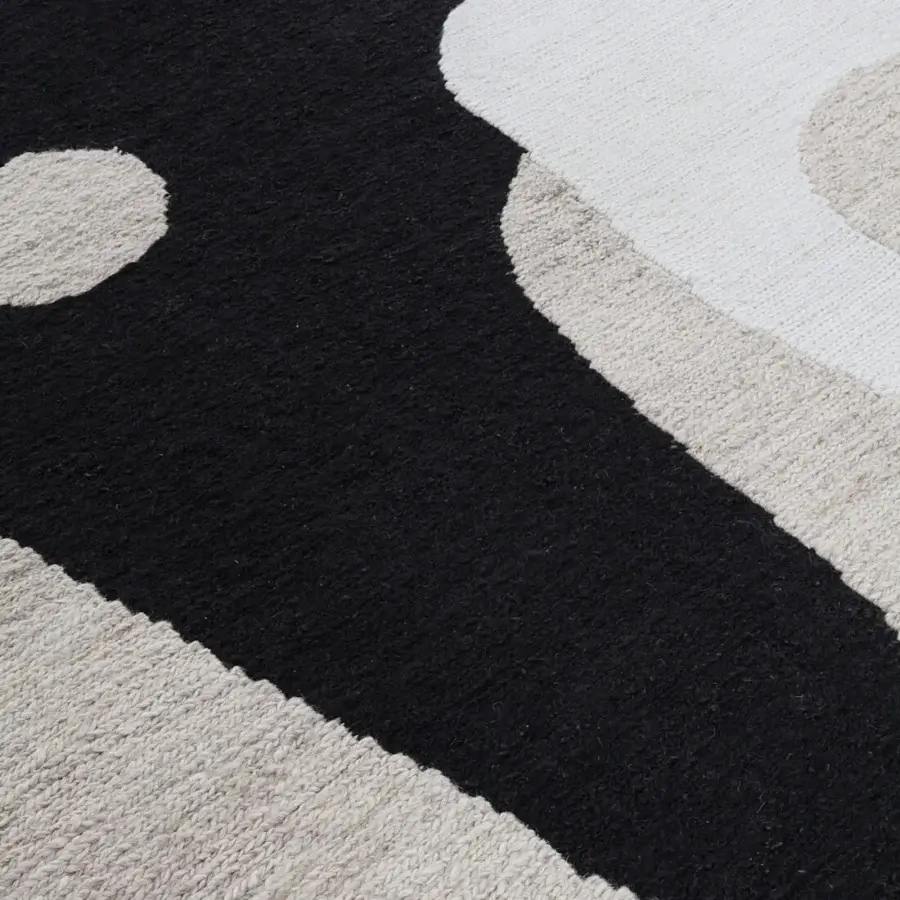 Superior Amini Jean rug with flowing abstract shapes woven in soft wool with ivory, dark grey and brown hues