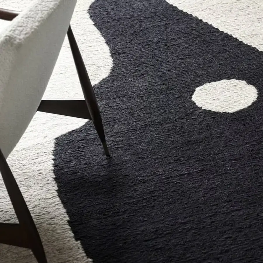 Lavish Amini Jean rug crafted from soft wool with an asymmetrical abstract design and hand-clipped texture