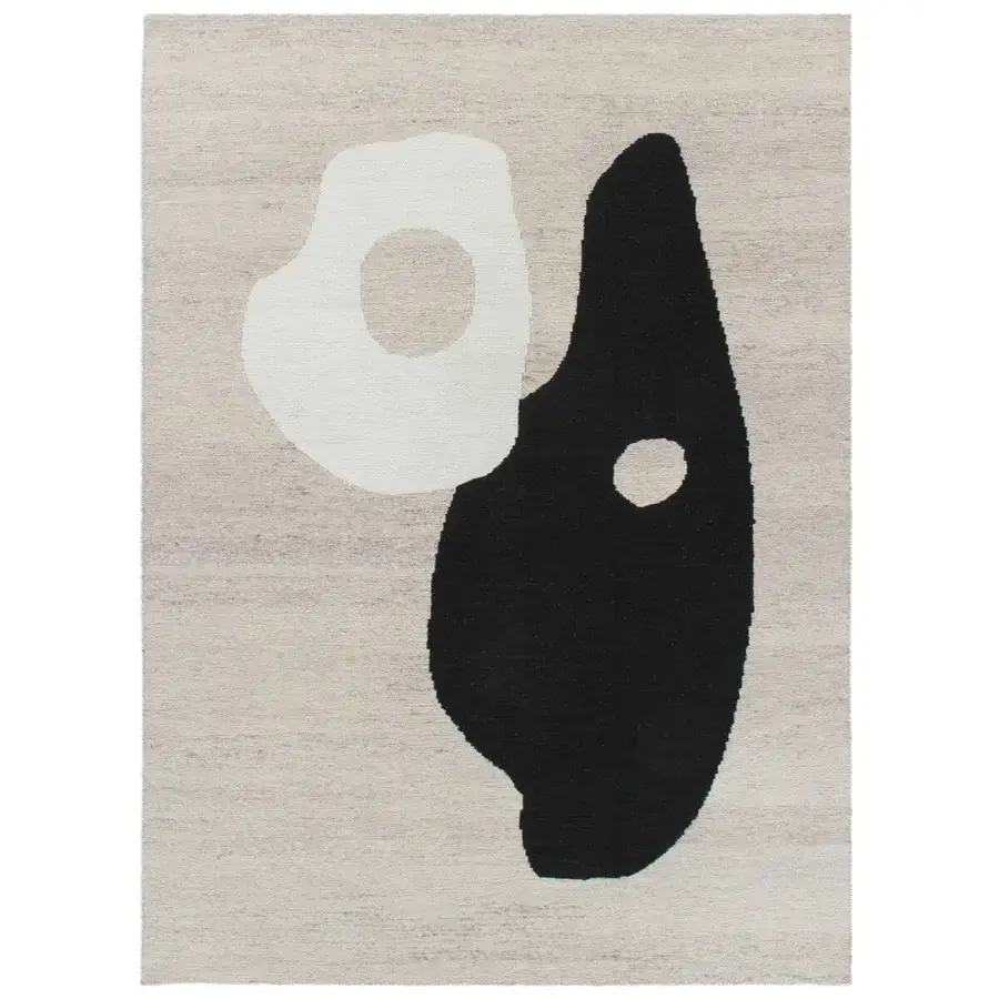 Distinguished Amini Jean rug crafted from soft wool with bold abstract organic shapes in dark grey and ivory against a textured beige background