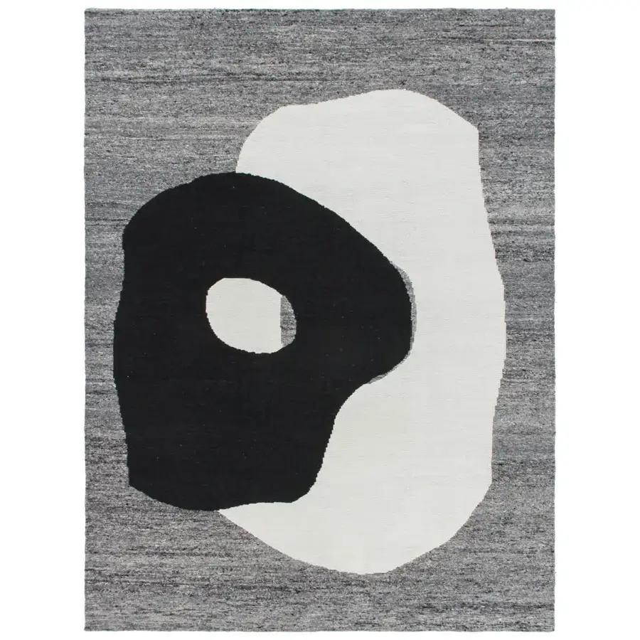 Exceptional Amini Jean rug displaying abstract biomorphic shapes in ivory, dark grey, and brown with raw jute and soft wool weave