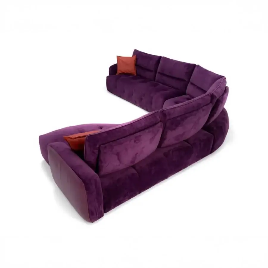 Elegant Egoitaliano Mavie sectional with curved design, rich purple velvet upholstery and detailed matte finish
