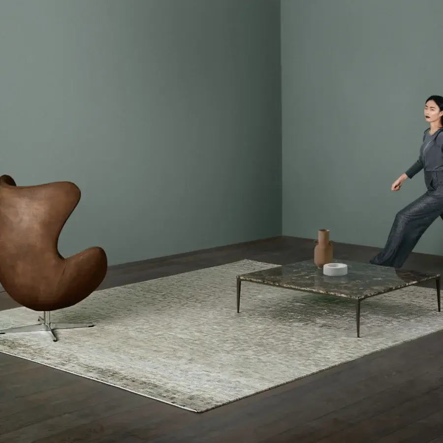 Exceptional Amini Lake rug hand-knotted in Nepal from pure silk with a muted green abstract faded pattern