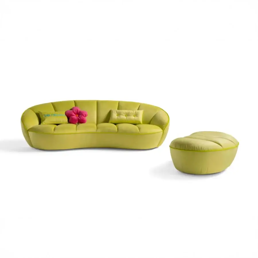 Distinguished Egoitaliano Shai sofa with a curved form upholstered in light green bi-elastic fabric and refined vertical stitching