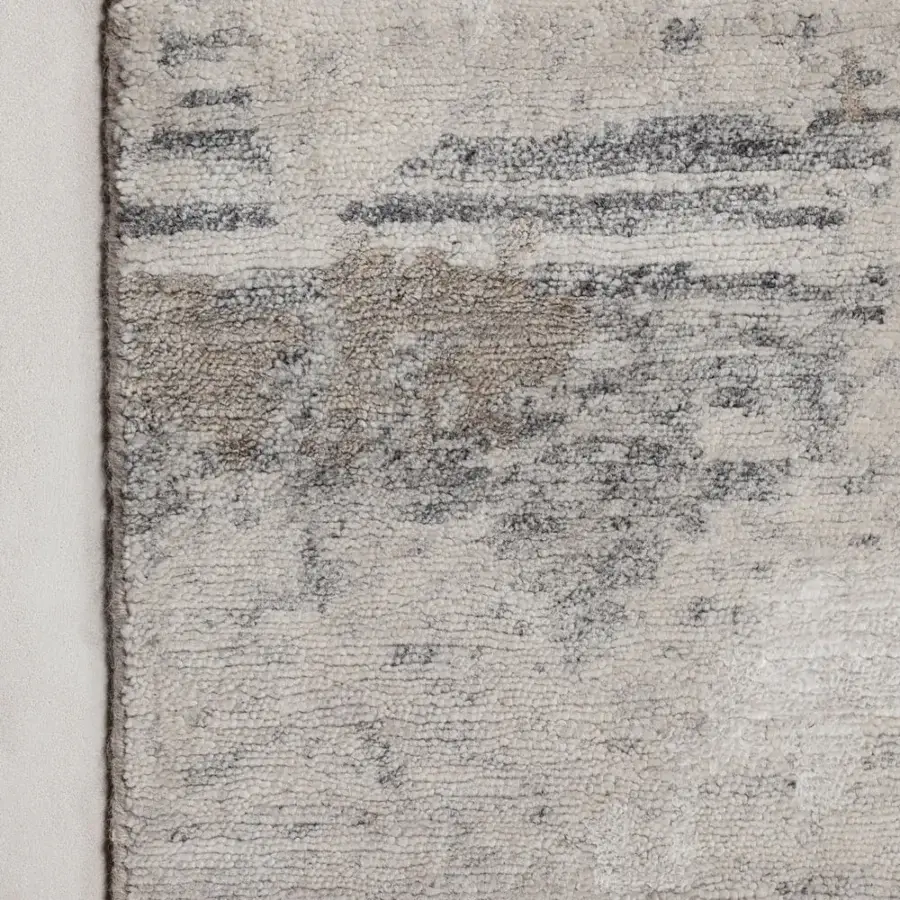 Distinguished Amini Pangea rug hand-knotted with wool and bamboo silk in off-white, cream, and gray tones with hand washing and carving
