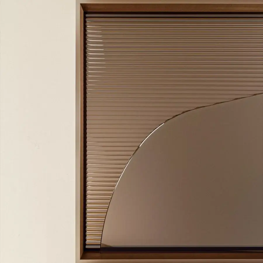 Exceptional Bontempi Impero mirror crafted in Italy with smooth and vertically ribbed glass in a warm brown tone