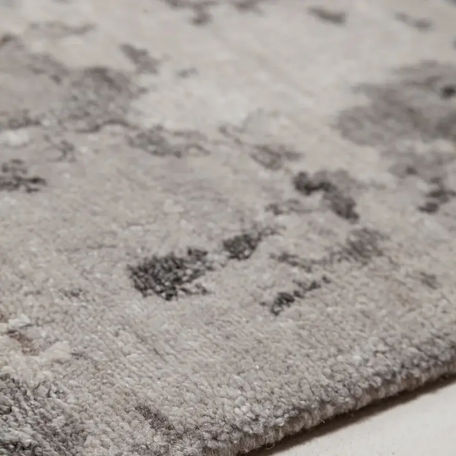 Distinguished Amini Pangea Geo rug hand-knotted in wool and bamboo silk with a subtle gradation and carved finish