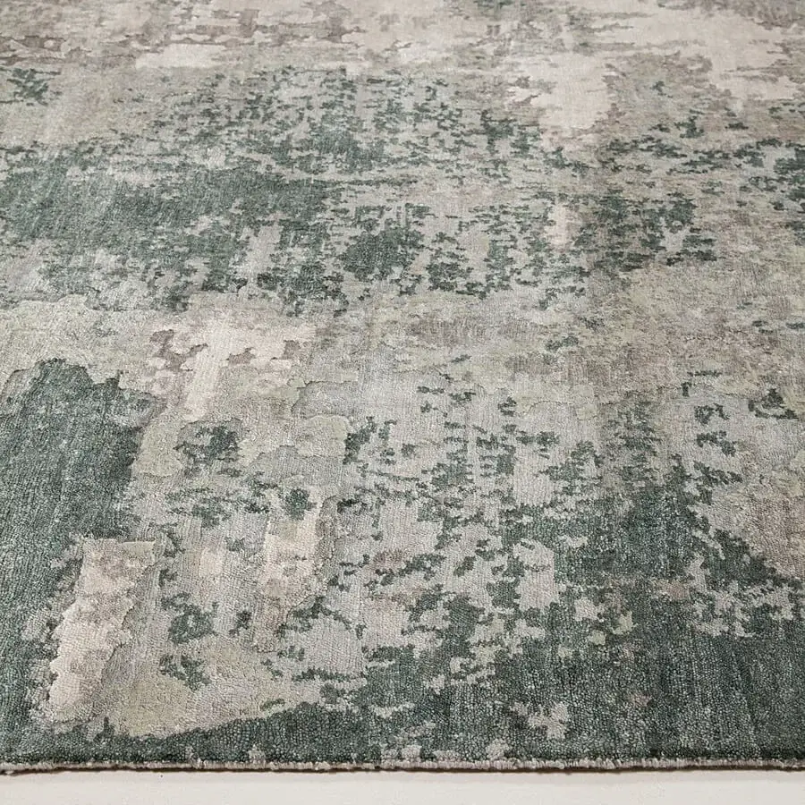 Lavish Amini Pangea Geo rug hand-knotted in India with wool and bamboo silk, showcasing grey and muted teal tones with a clipped finish