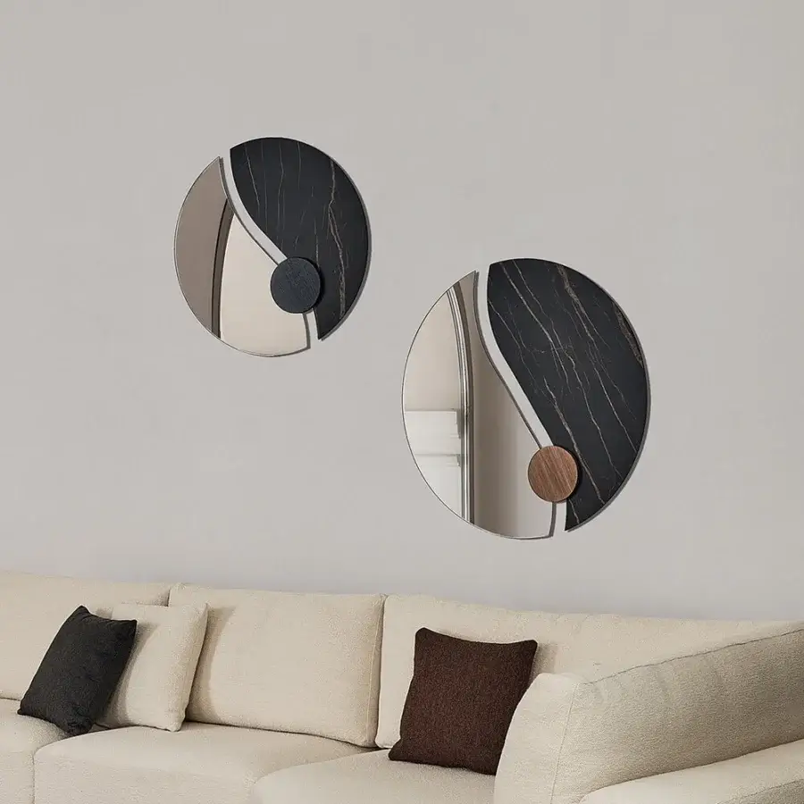 Harmonious Bontempi Luxor mirror with overlapping geometric forms in glossy mirrored and dark matte opaque sections with light brown wood