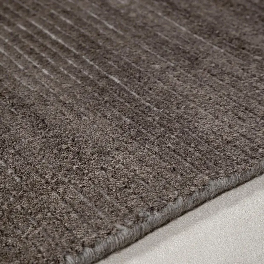 Lavish Amini Twilight rug hand-loomed with heathered grey silk and Tibetan wool in a pile loop and cut finish
