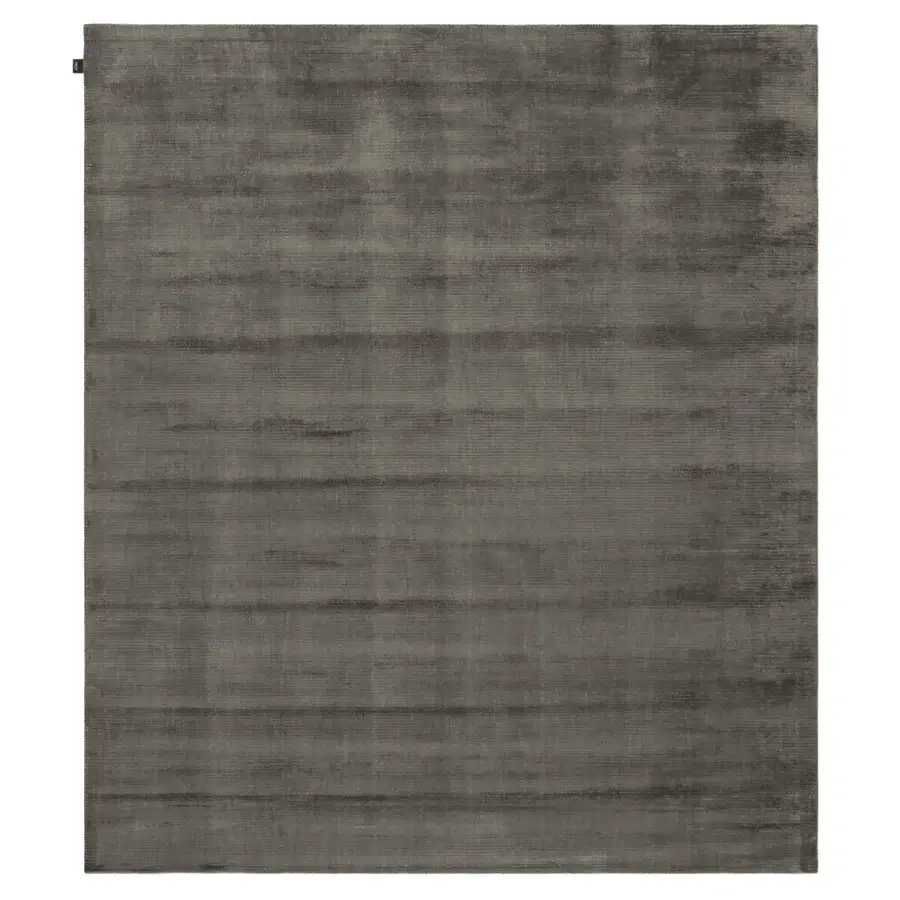 Distinguished Amini Twilight rug hand-loomed in India with Tibetan wool and natural silk featuring a pile loop and cut finish