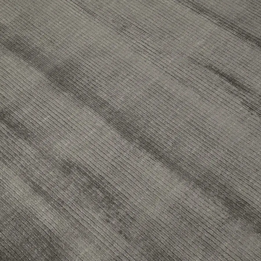 Exquisite Amini Twilight rug hand-loomed in a blend of Tibetan wool and natural silk with tonal grey variations and pile loop cut finish