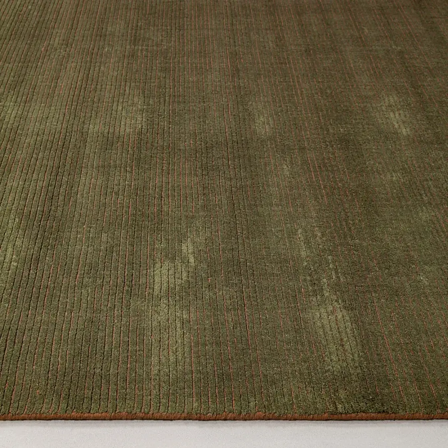 Lavish Amini Twilight rug hand-loomed in Tibetan wool and natural silk with olive green hues and reddish-brown border finish