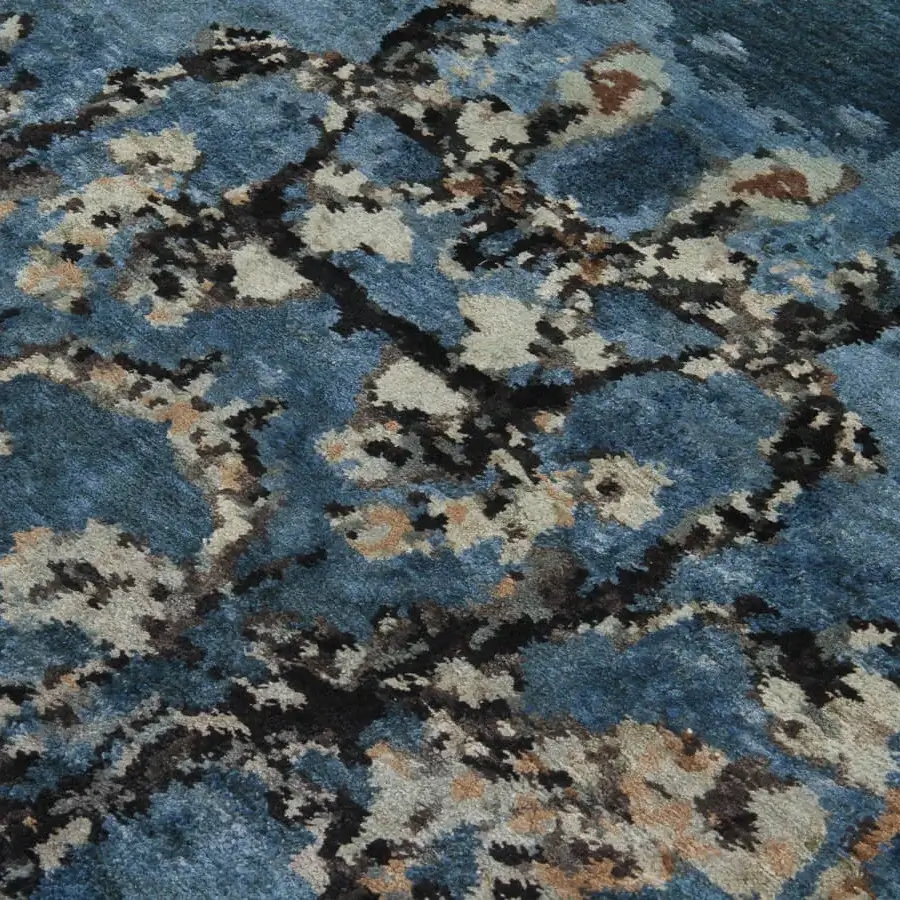 Lavish Amini Vincent rug crafted from pure silk in muted blue with subtle cream and charcoal accents and hand washing