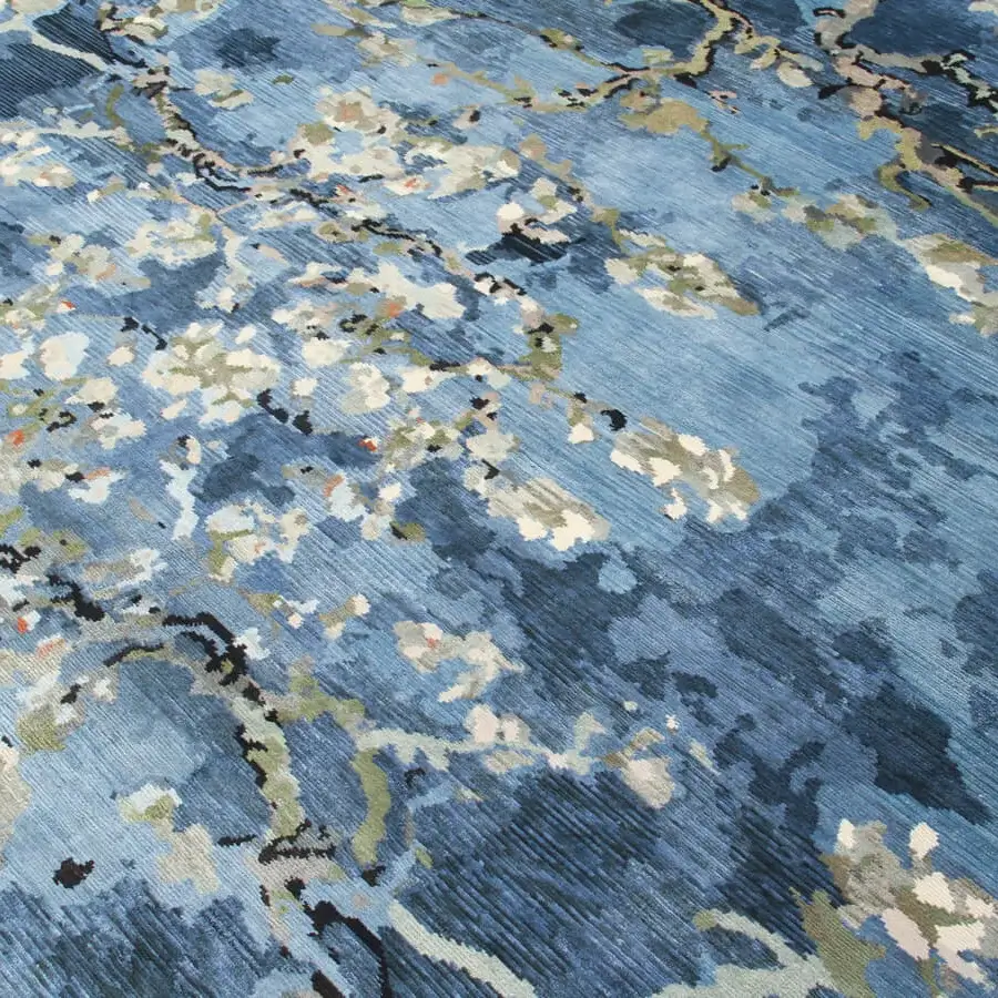 Distinguished Amini Vincent rug crafted from pure silk with contemporary floral design in shades of blue, cream and green