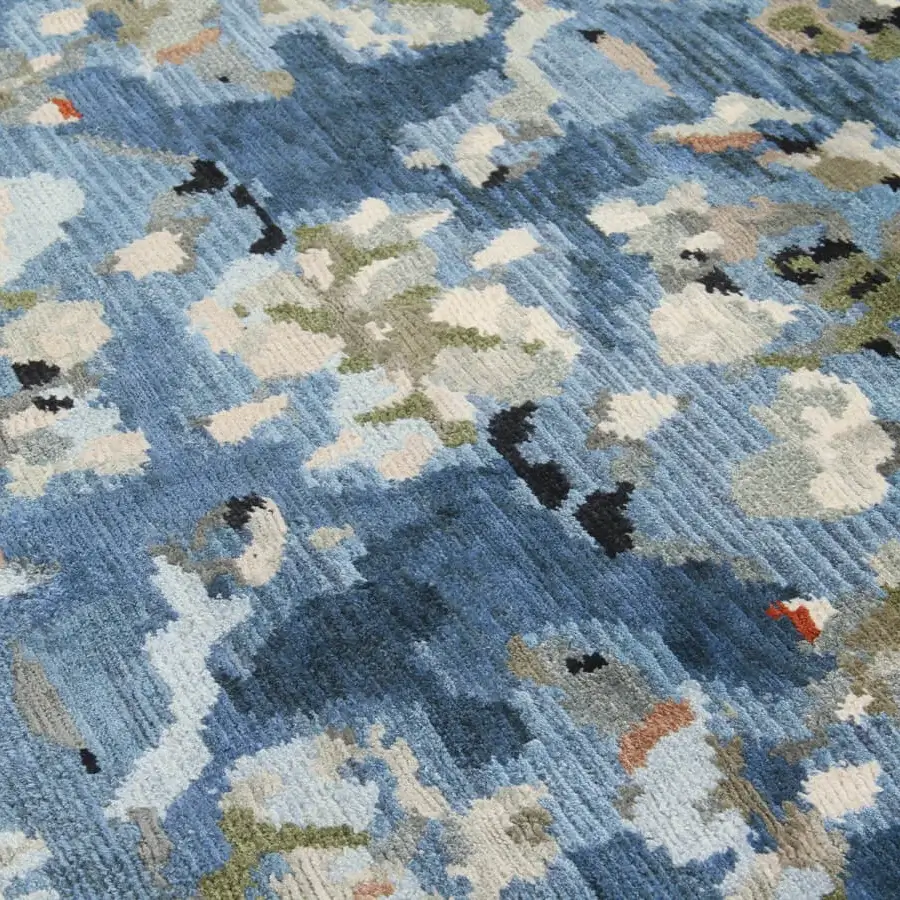 Superior Amini Vincent rug crafted from pure silk with flowing floral motifs and meticulous hand washing