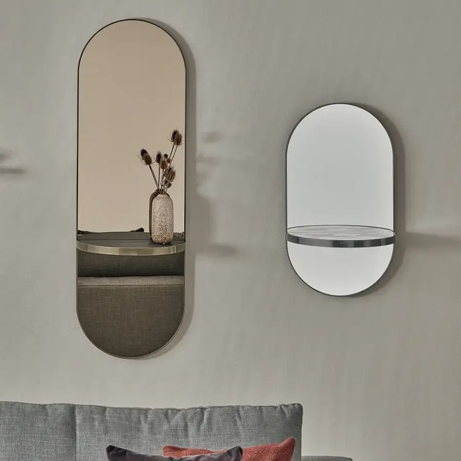 Elegant Bontempi Pill Mirror wall décor with glossy smoky surface, dark metal frame and integrated shelf crafted in Italy