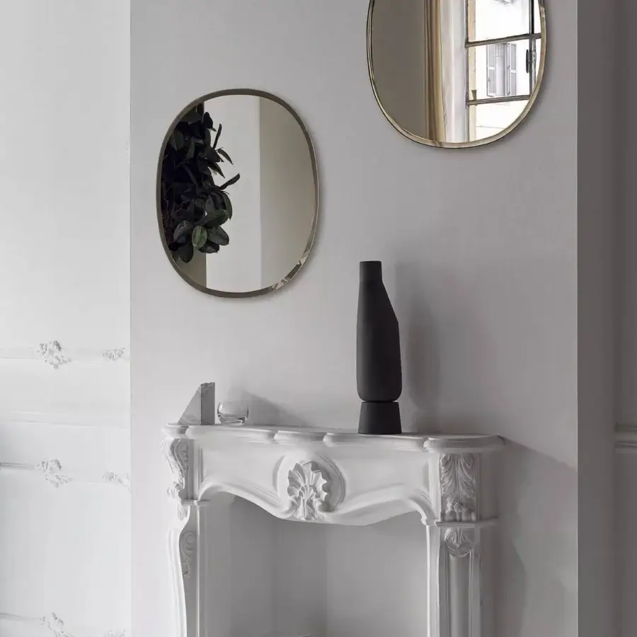 Distinguished Bontempi Renoir mirror with elegantly shaped gold-toned metal frame and clear glass reflection in glossy finish