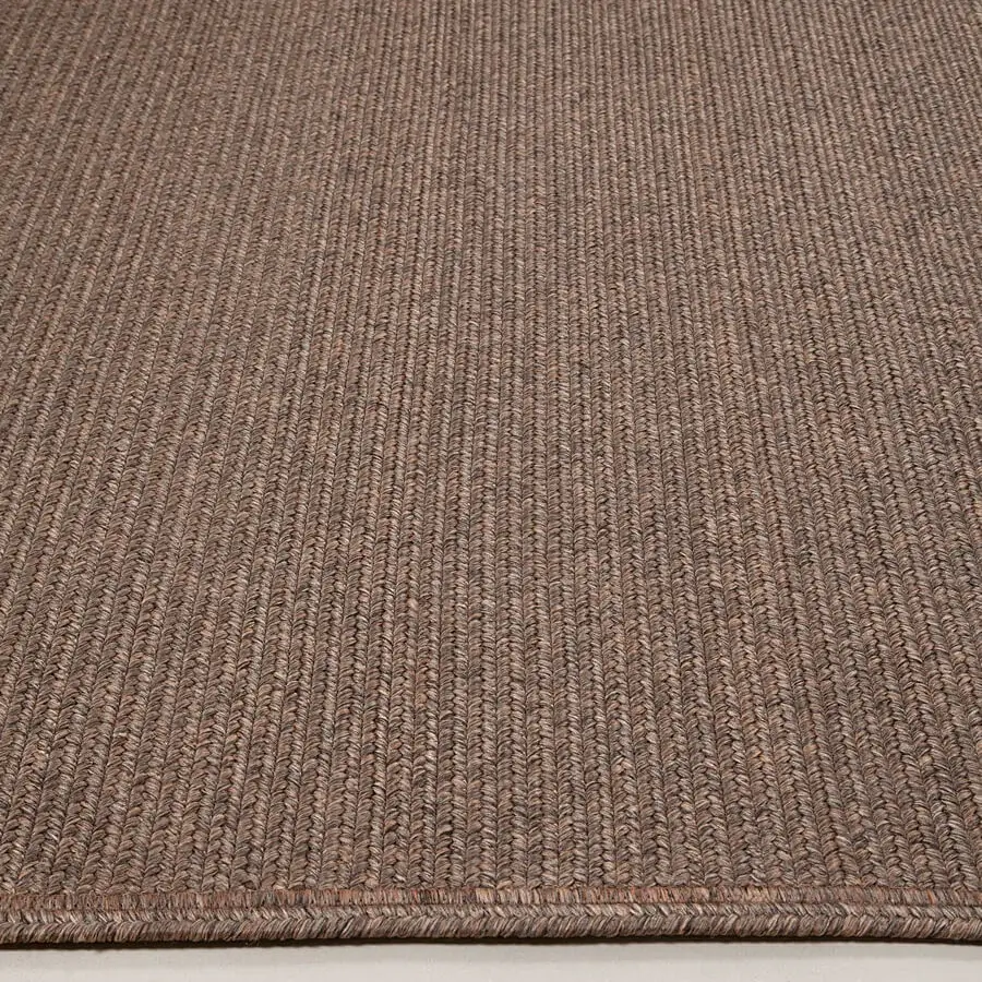 Lavish Amini Plain rug hand-braided in India with polypropylene, viscose, and polyester, finished with hand-clipped edges