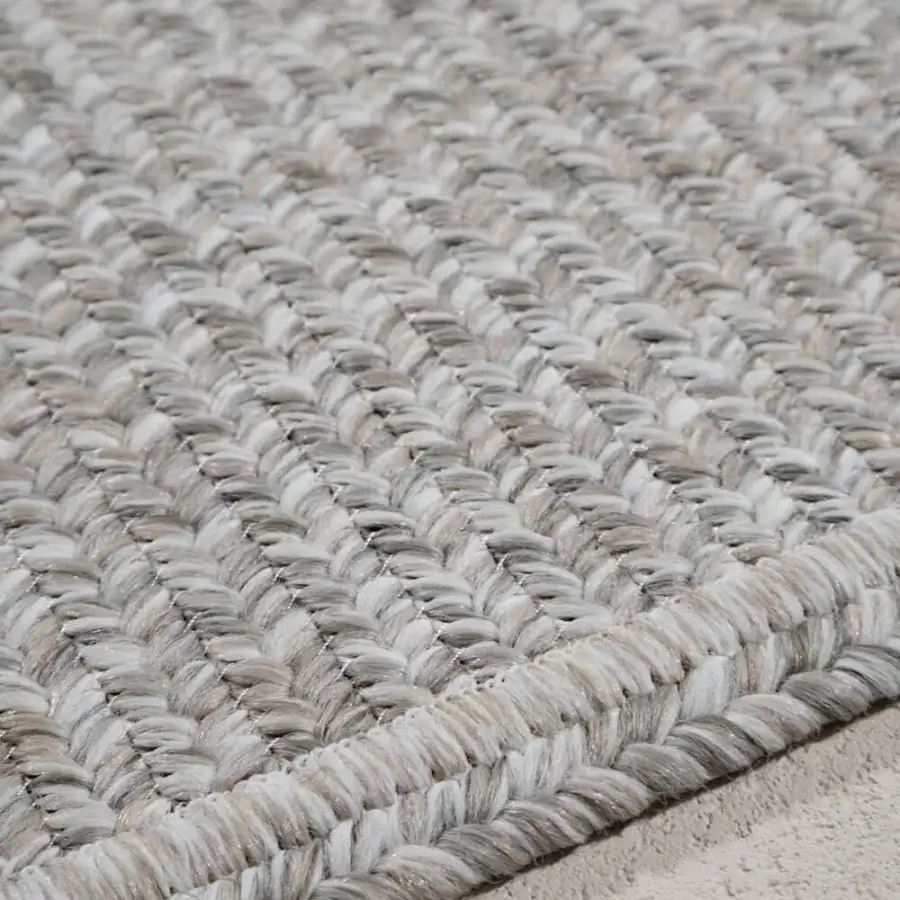 Distinguished Amini Plain rug hand-braided in India with polypropylene, viscose, and polyester, exhibiting a textured neutral beige weave and hand clipping
