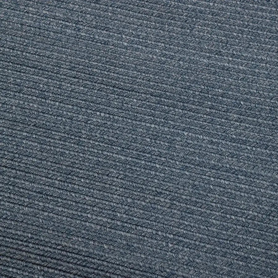 Elegant Amini Plain rug hand-braided in India with polypropylene, viscose, and polyester, showcasing a muted blue-gray tone and hand clipping