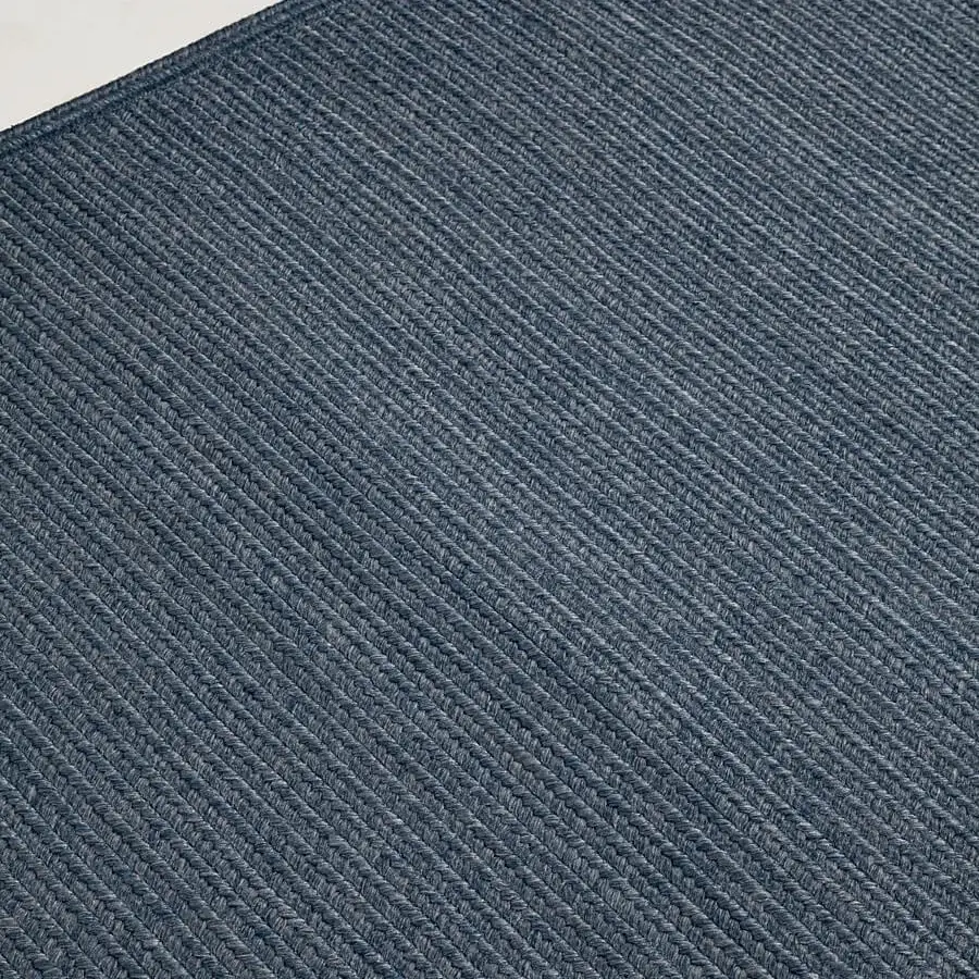 Distinguished Amini Plain rug crafted in India with heathered blue-gray polypropylene, viscose, and polyester plus a hand-clipped finish