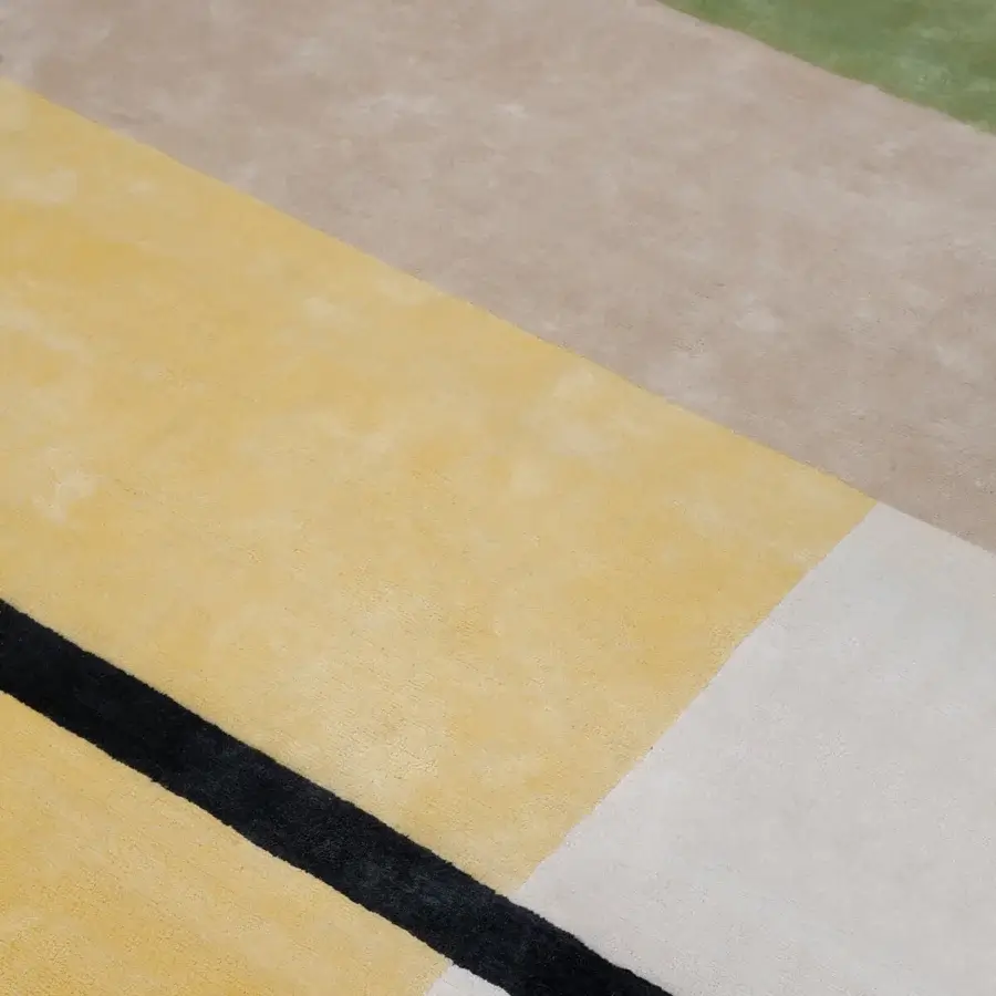 Captivating Amini Nostalghia rug with geometric design in Terra and Acqua tones, hand-knotted from organic cotton with a hand-washed finish