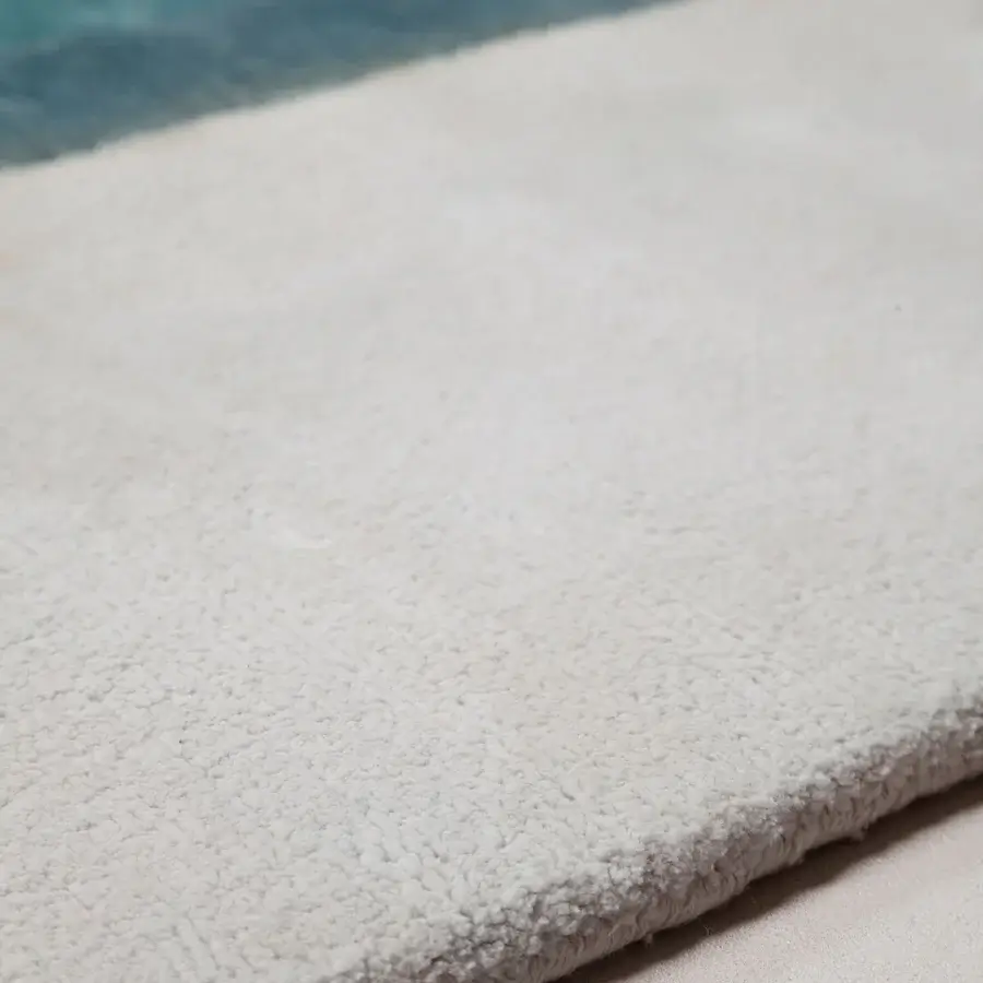 Distinguished Amini Nostalghia rug with color-blocked design crafted in organic cotton and finished with a subtly frayed edge