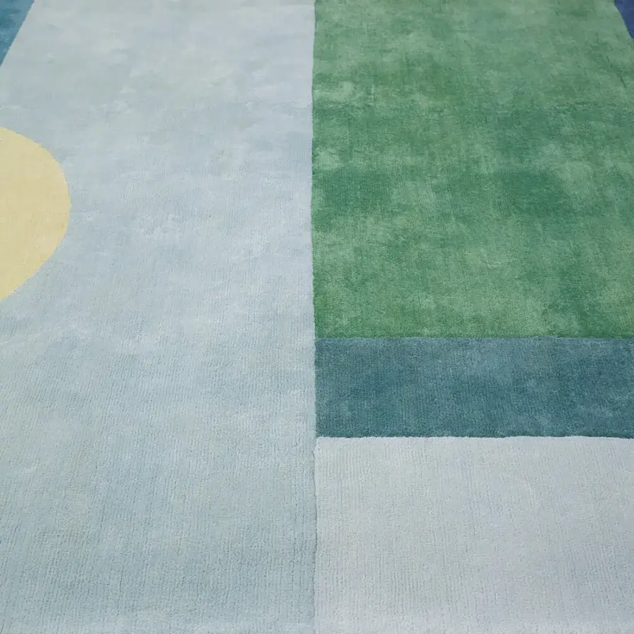 Exceptional Amini Nostalghia rug with contemporary geometric design hand-knotted in organic cotton with natural dyes and meticulous carving